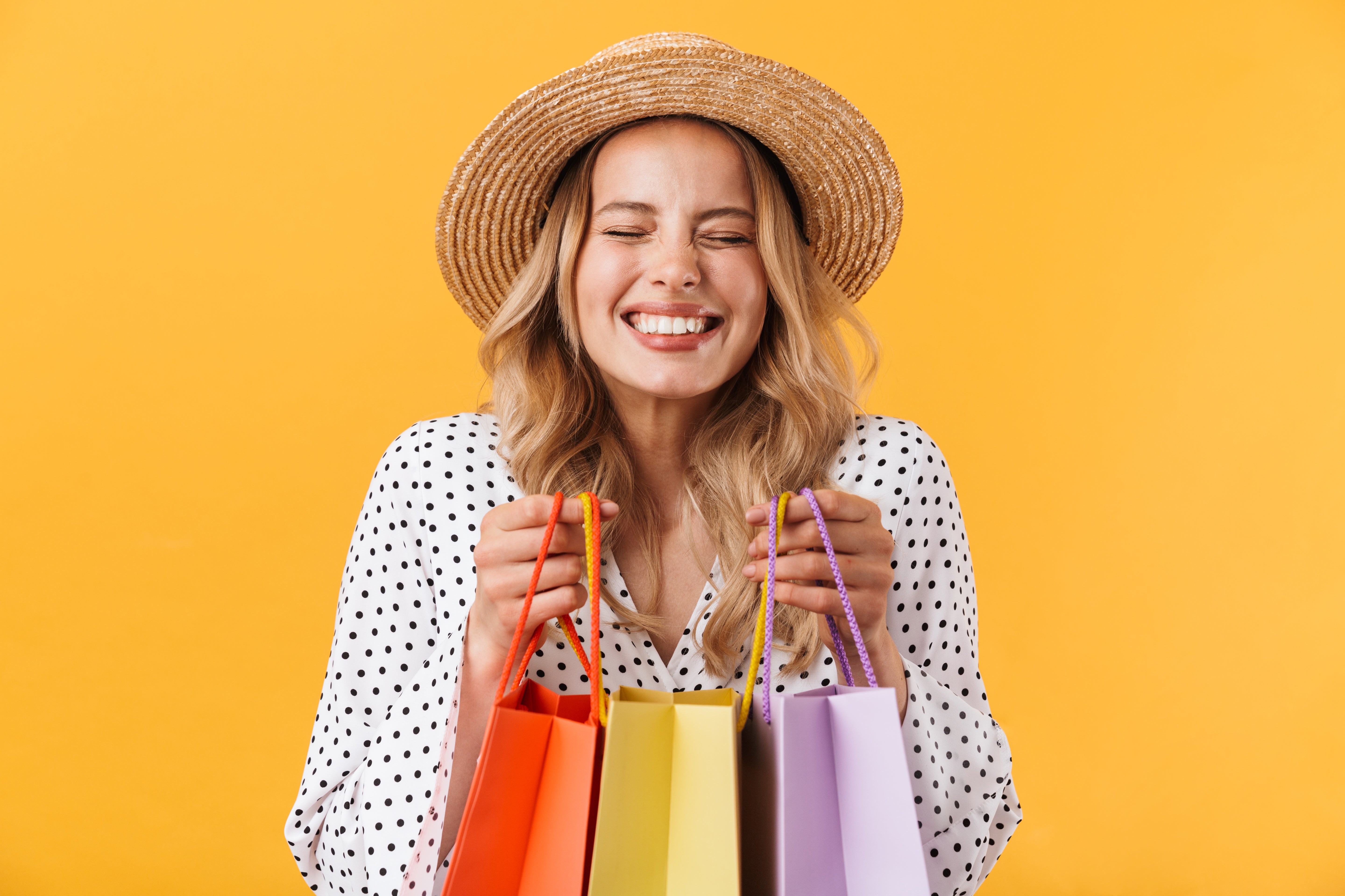 Happy girl with shopping bags